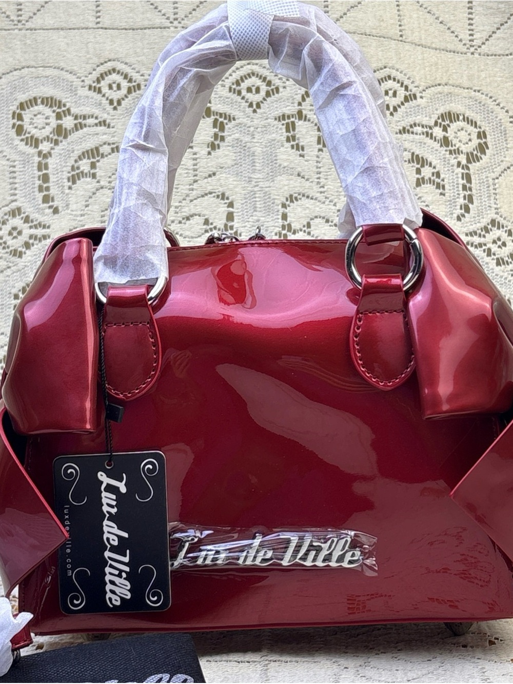 Lux de Ville glossy crimson patent top-handle crossbody satchel